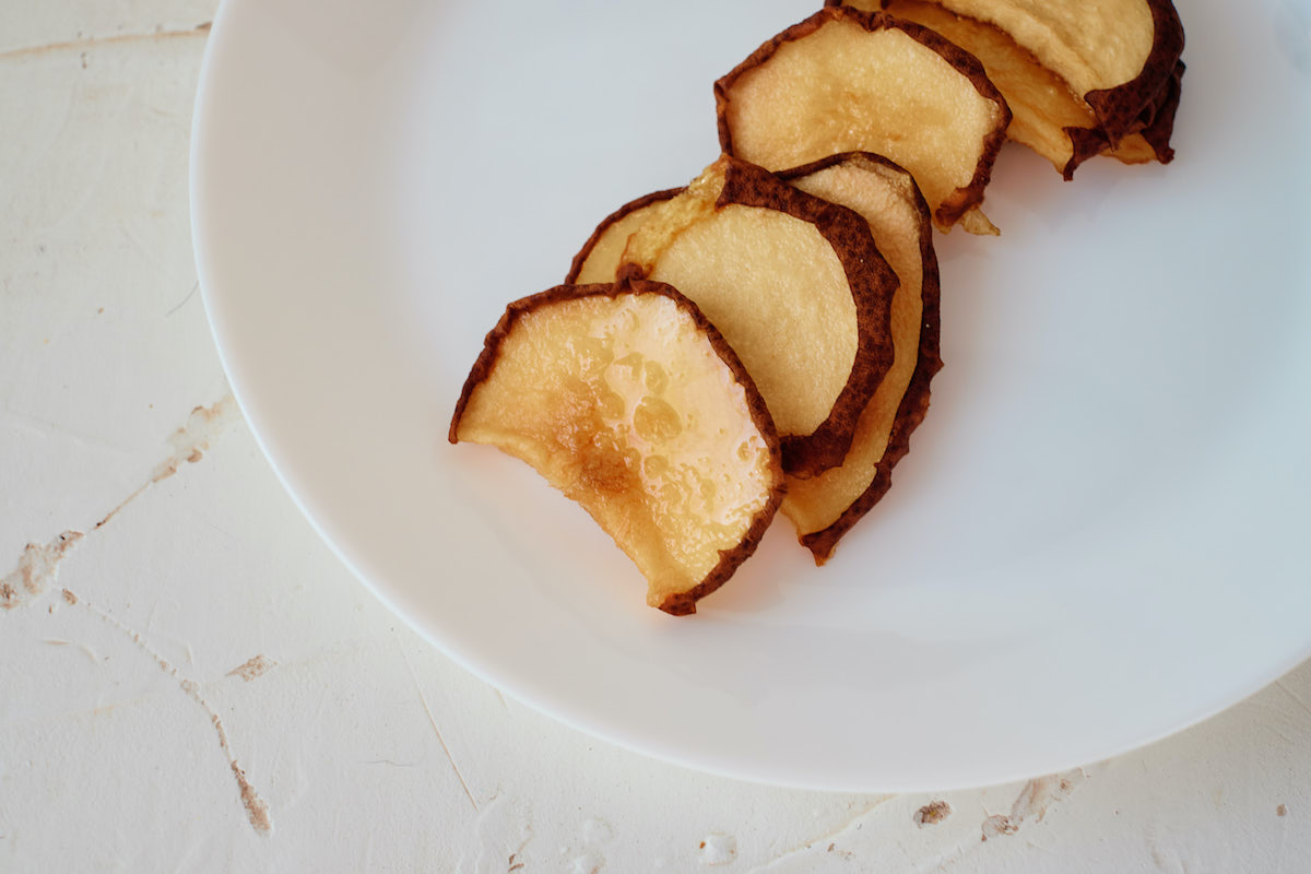 dried pear slices on white plate